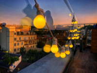 kelly-sikkema-v9FQR4tbIq8-unsplash Evozon terrace view with lights