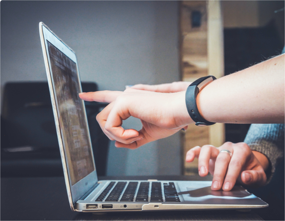 Programmers working with pair programming to solve coding challenge